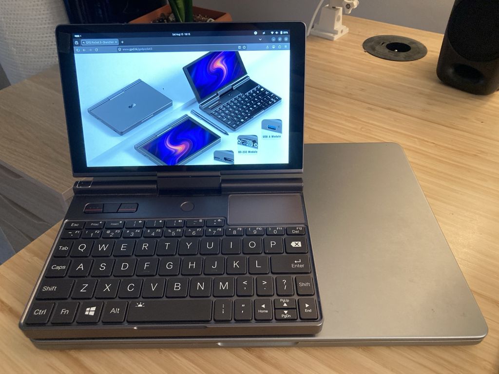 A tiny laptop. 13" macbook for size, it looks twice as large.